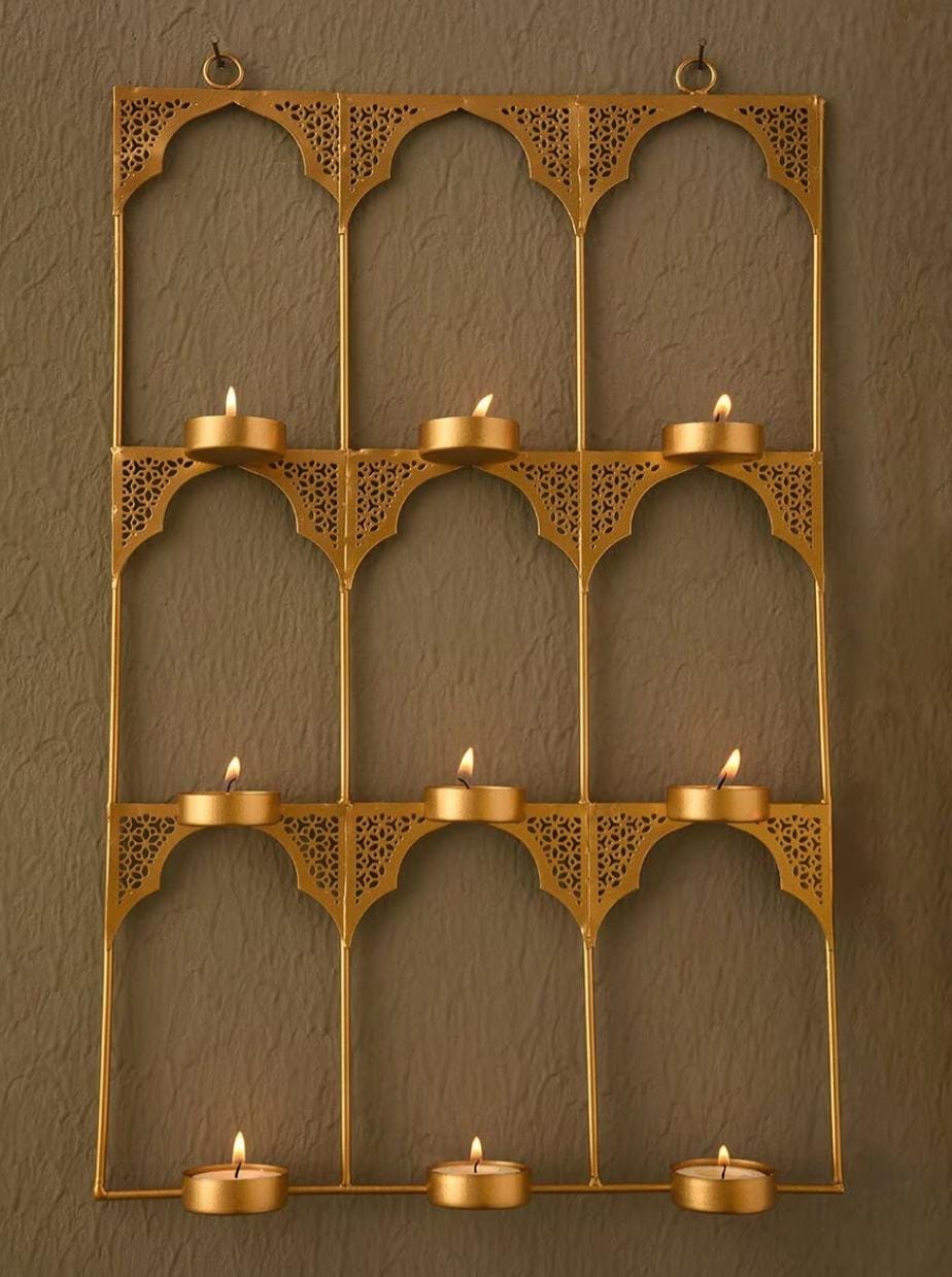 Introducing Gold Metal Tea Light Holders Made Of Iron.Bring Home a piece of Modern Indian Aesthetic, Reflecting Crafts.
