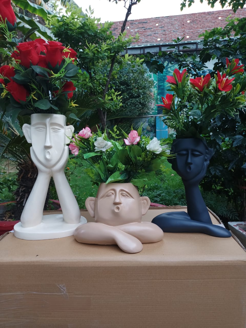 Polyresin Day Dreaming Face Planters, White and Brown